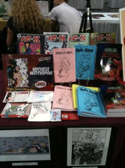 Jammed full of goodies at my table. Artist Alley section at the NYCC 2010. NYC